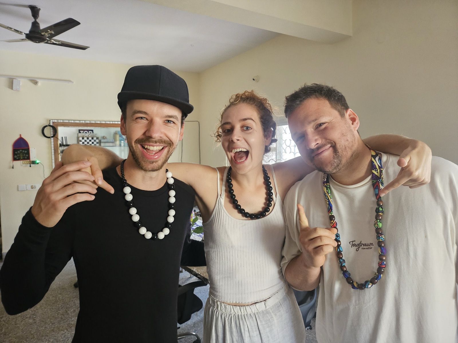 Three friends pulling faces for the camera